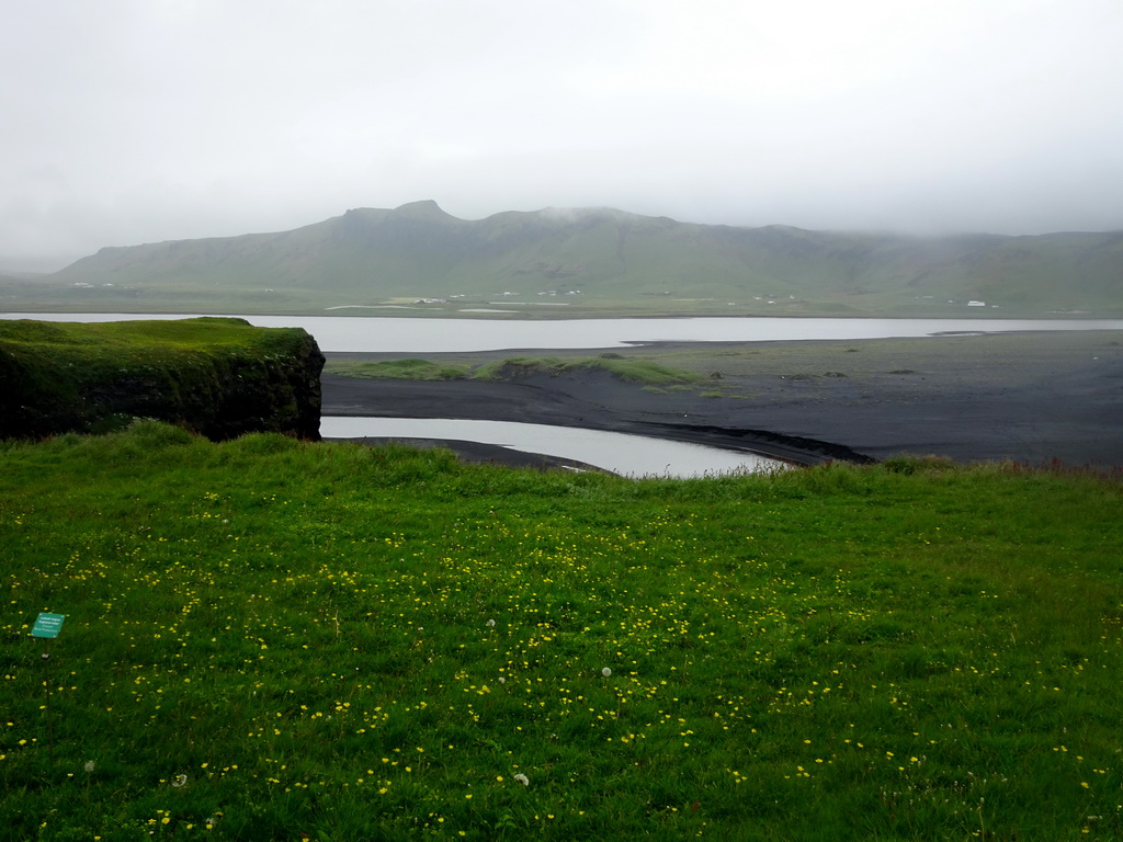 Kirkjufjara beach and Reynisfjara Beach, viewed from the lower viewpoint of the Dyrhólaey peninsula