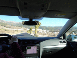 Miaomiao driving the rental car on the TF-51 road, with a view on the south side of the town