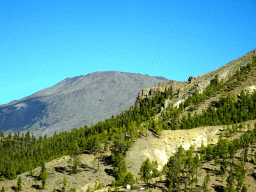 Mountains and trees on the southwest side of the Teide National Park, viewed from the rental car on the TF-21 road