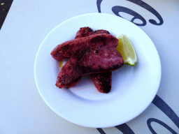 Sausage at the terrace of the Restaurante Fuente Hermano Pedro at the Plaza Doctor Pérez Cáceres square