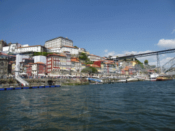 Porto with the Cais da Ribeira street, the Igreja dos Grilos church and the Paço Episcopal do Porto palace and the Ponte Luís I bridge over the Douro river, viewed from the ferry from Porto