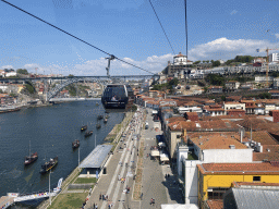 Boats and the Ponte Luís I and Ponte Infante Dom Henrique bridges over the Douro river, the Avenida de Diogo Leite street and the Mosteiro da Serra do Pilar monastery, viewed from the Gaia Cable Car