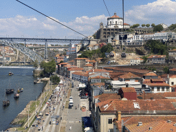 Boats and the Ponte Luís I and Ponte Infante Dom Henrique bridges over the Douro river, the Avenida de Diogo Leite street and the Mosteiro da Serra do Pilar monastery, viewed from the Gaia Cable Car