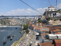 Boats and the Ponte Luís I and Ponte Infante Dom Henrique bridges over the Douro river, the Avenida de Diogo Leite street and the Mosteiro da Serra do Pilar monastery, viewed from the Gaia Cable Car