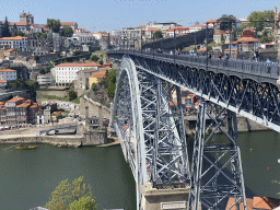 Porto with the Porto Cathedral and the Muralha Fernandina wall and the Ponte Luís I bridge over the Douro river, viewed from the Miradouro da Ribeira viewing point