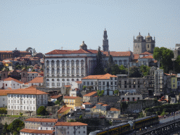 Subway train on the Ponte Luís I bridge over the Douro river and Porto with the Paço Episcopal do Porto palace, the Torre dos Clérigos tower and the Porto Cathedral, viewed from the Miradouro da Serra do Pilar viewing point at the Largo Aviz square
