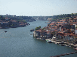 The Ponte da Arrábida bridge over the Douro river and Porto with the Viaduto do Cais das Pedras viaduct, the Igreja Monumento de São Francisco church and the Palácio da Bolsa palace, viewed from the Miradouro da Serra do Pilar viewing point at the Largo Aviz square