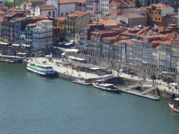 Boats on the Douro river and the Cais da Ribeira street at Porto, viewed from the Miradouro da Serra do Pilar viewing point at the Largo Aviz square