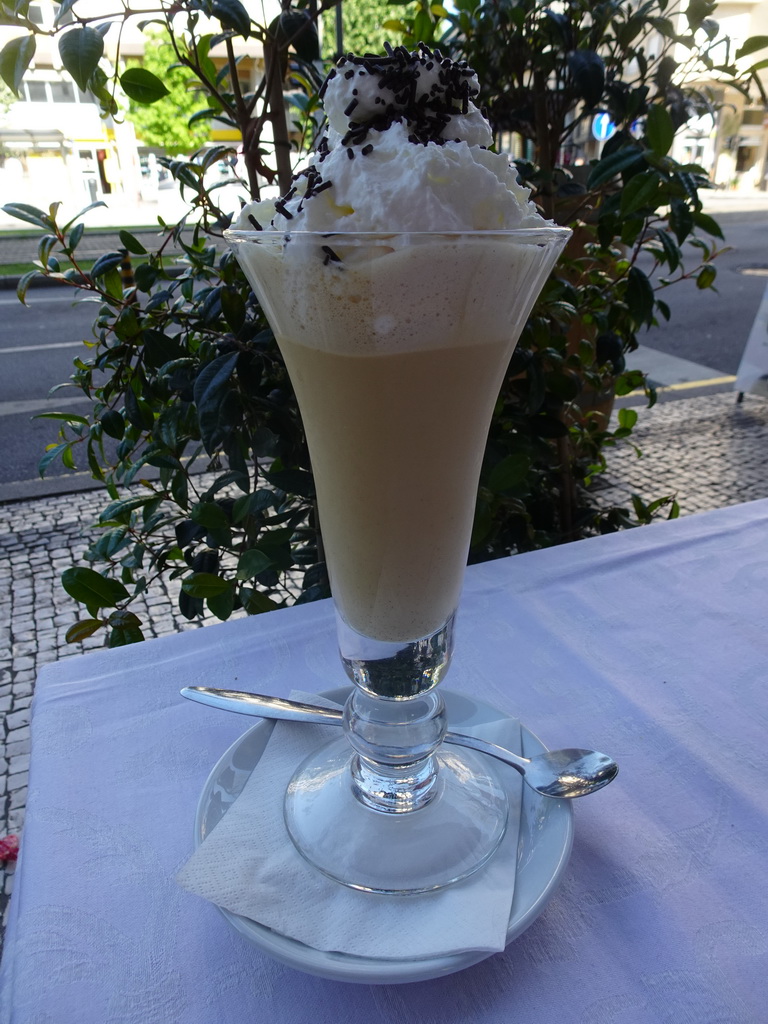 Irish coffee at the terrace of the Caffè Italia Gaia restaurant at the Avenida da República street