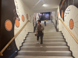 Miaomiao and Max on a staircase at the Chocolate Story museum at the WOW Cultural District