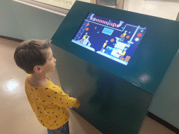 Max with an interactive screen at the Chocolate Factory section at the Chocolate Story museum at the WOW Cultural District