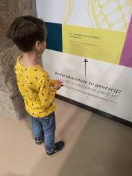 Max with a warning against feeding chocolate to dogs and cats at the Chocolate Factory section at the Chocolate Story museum at the WOW Cultural District