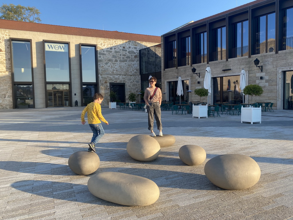 Miaomiao and Max with stepping stones at the Main Square at the WOW Cultural District