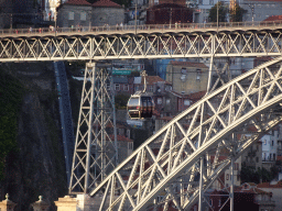 Gaia Cable Car in front of the Ponte Luís I bridge over the Douro river, viewed from the Main Square at the WOW Cultural District
