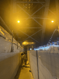 The lower level of the Ponte Luís I bridge over the Douro river to Porto, by night