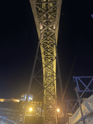 The upper level of the Ponte Luís I bridge over the Douro river to Porto, viewed from the lower level, by night