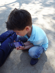 Max playing with iPhone at the Zoo Santo Inácio