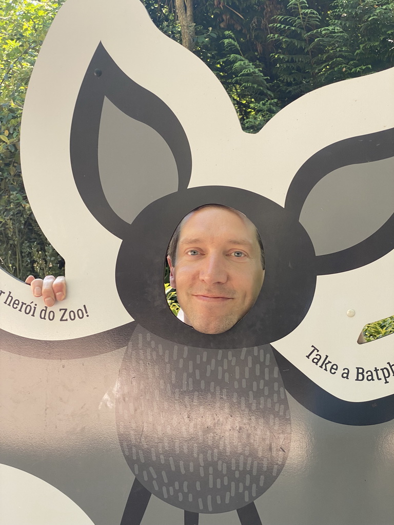 Tim with a cardboard with a Bat at the Zoo Santo Inácio