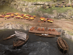 Scale models of boats and market stalls at the Porto Region Across the Ages museum at the WOW Cultural District