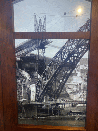 Old photograph of the construction of the Ponte Luís I bridge over the Douro river at the Porto Region Across the Ages museum at the WOW Cultural District