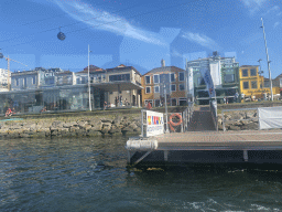 The ferry dock at the Avenida de Diogo Leite street, viewed from the ferry over the Douro river