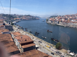 Boats and the Ponte da Arrábida bridge over the Douro river, the Avenida de Diogo Leite street and Porto with the Cais da Estiva and Cais da Ribeira streets, viewed from the Gaia Cable Car