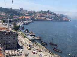 Boats on the Douro river and the Avenida de Diogo Leite and Avenida de Ramos Pinto streets, viewed from the Gaia Cable Car