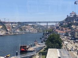 Boats and the Ponte Luís I and Ponte Infante Dom Henrique bridges over the Douro river, the Avenida de Diogo Leite street and the Mosteiro da Serra do Pilar monastery, viewed from the Gaia Cable Car