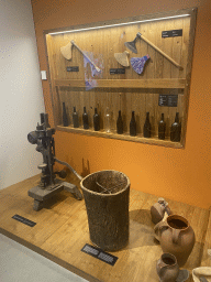Axes, bottles, machinery, tree bark and vases at the Planet Cork museum at the WOW Cultural District
