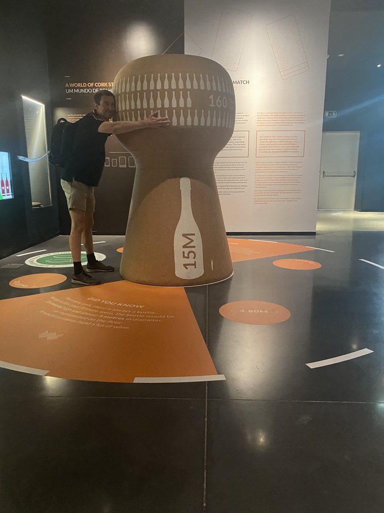Tim with a large cork stopper at the Planet Cork museum at the WOW Cultural District