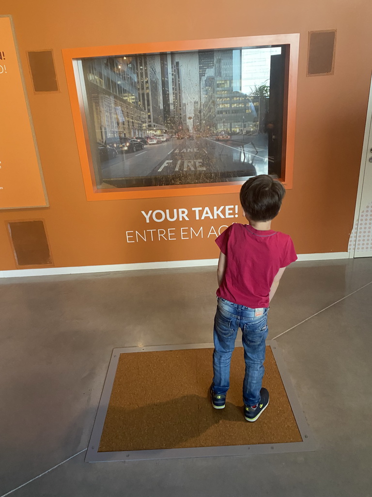 Max playing a cork game at the Planet Cork museum at the WOW Cultural District
