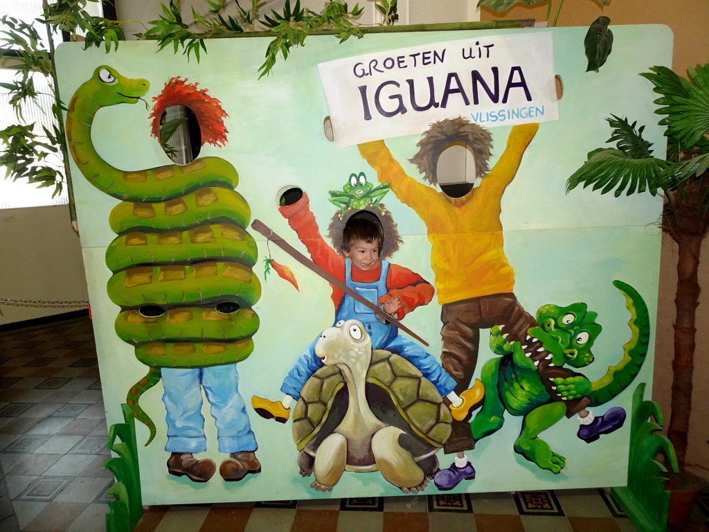 Max with a cardboard at the Iguana Reptile Zoo