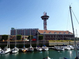 Boats at the Michiel de Ruyter Harbor Marina and the Arsenaal building, viewed from the Zeilmarkt square