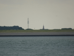 The tower of the Hervormde Kerk Stavenisse church, viewed from the Seal Safari boat on the National Park Oosterschelde