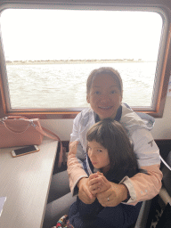 Miaomiao and Max at the Seal Safari boat on the National Park Oosterschelde, with a view on the seals at the Vondelingsplaat sandbank