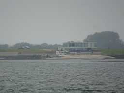 The Weegbrug Viane building at the Viane street at Ouwerkerk, viewed from the Seal Safari boat on the National Park Oosterschelde