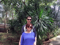 Tim and Miaomiao with a Cambodian Dragon Tree at the Xinglong Tropical Garden