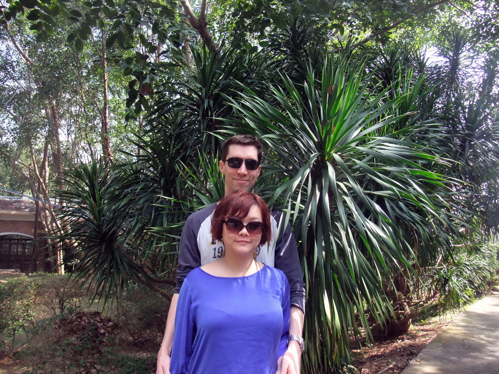 Tim and Miaomiao with a Cambodian Dragon Tree at the Xinglong Tropical Garden