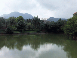 Pool, trees and mountains at the Xinglong Tropical Garden