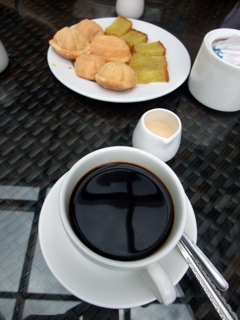 Coffee and cake in a restaurant at the Xinglong Tropical Garden