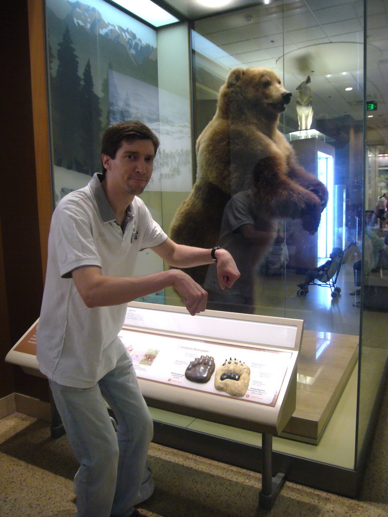 Tim and a stuffed bear in the National Museum of Natural History