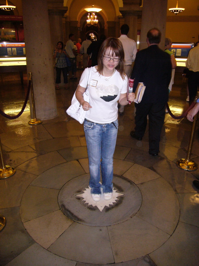 Miaomiao on the star that marks the center of the four quadrants of the city, in the Crypt of the U.S. Capitol