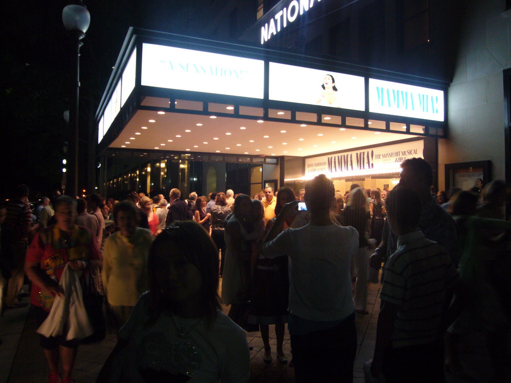 Miaomiao in front of the National Theatre, after the musical `Mamma Mia`, by night