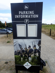 Sign at the parking lot of the Mémorial 1815 museum at the Route du Lion road