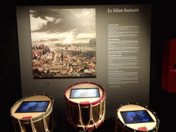 Painting and drums with an explanation on the Cost in Human Lives, at the Lower Floor of the Mémorial 1815 museum
