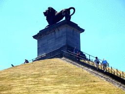 Miaomiao and her parents in front of the Lion statue on top of the Lion`s Mound