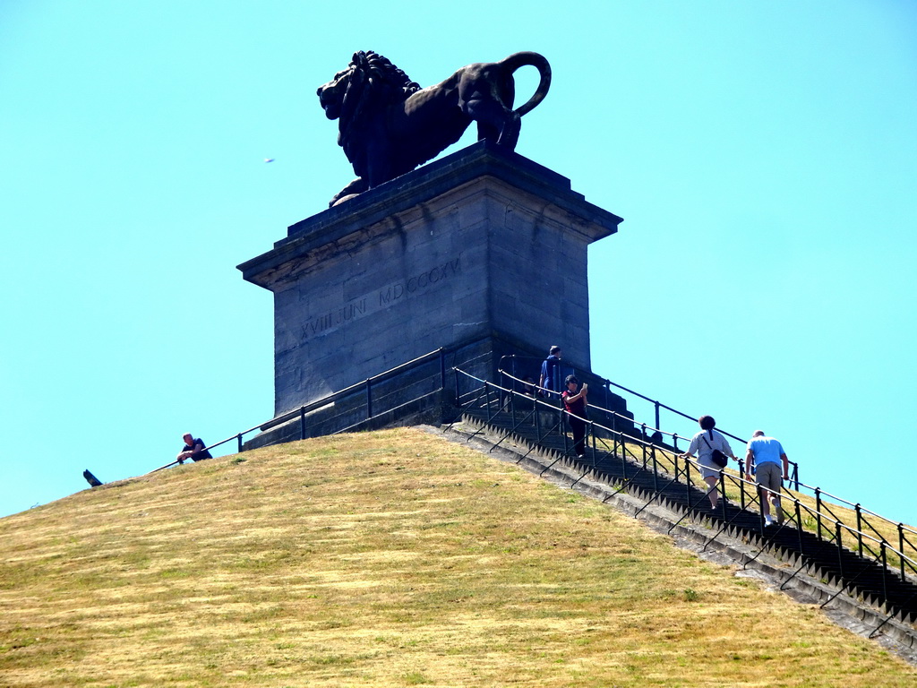 Miaomiao and her parents in front of the Lion statue on top of the Lion`s Mound