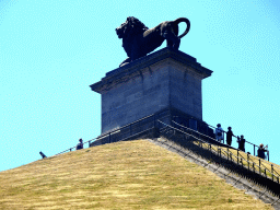 Miaomiao and her parents in front of the Lion statue on top of the Lion`s Mound