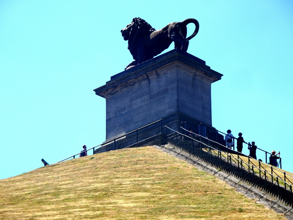 Miaomiao and her parents in front of the Lion statue on top of the Lion`s Mound