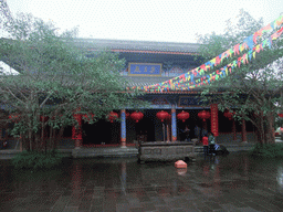 Temple with burning incense at the Yuchan Palace at the Hainan Wenbifeng Taoism Park